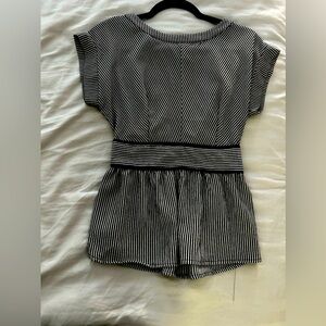 Classic striped blouse a versatile fit—ideal for casual or business chic styles!